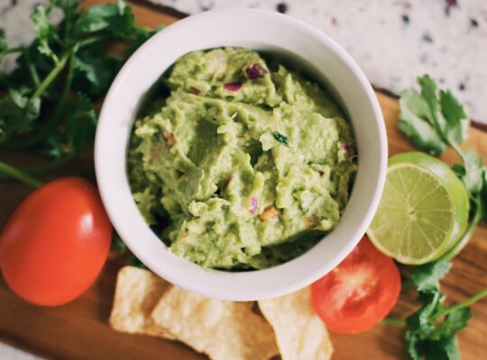 green soup in white ceramic bowl