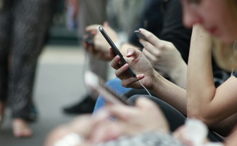 person holding black phone